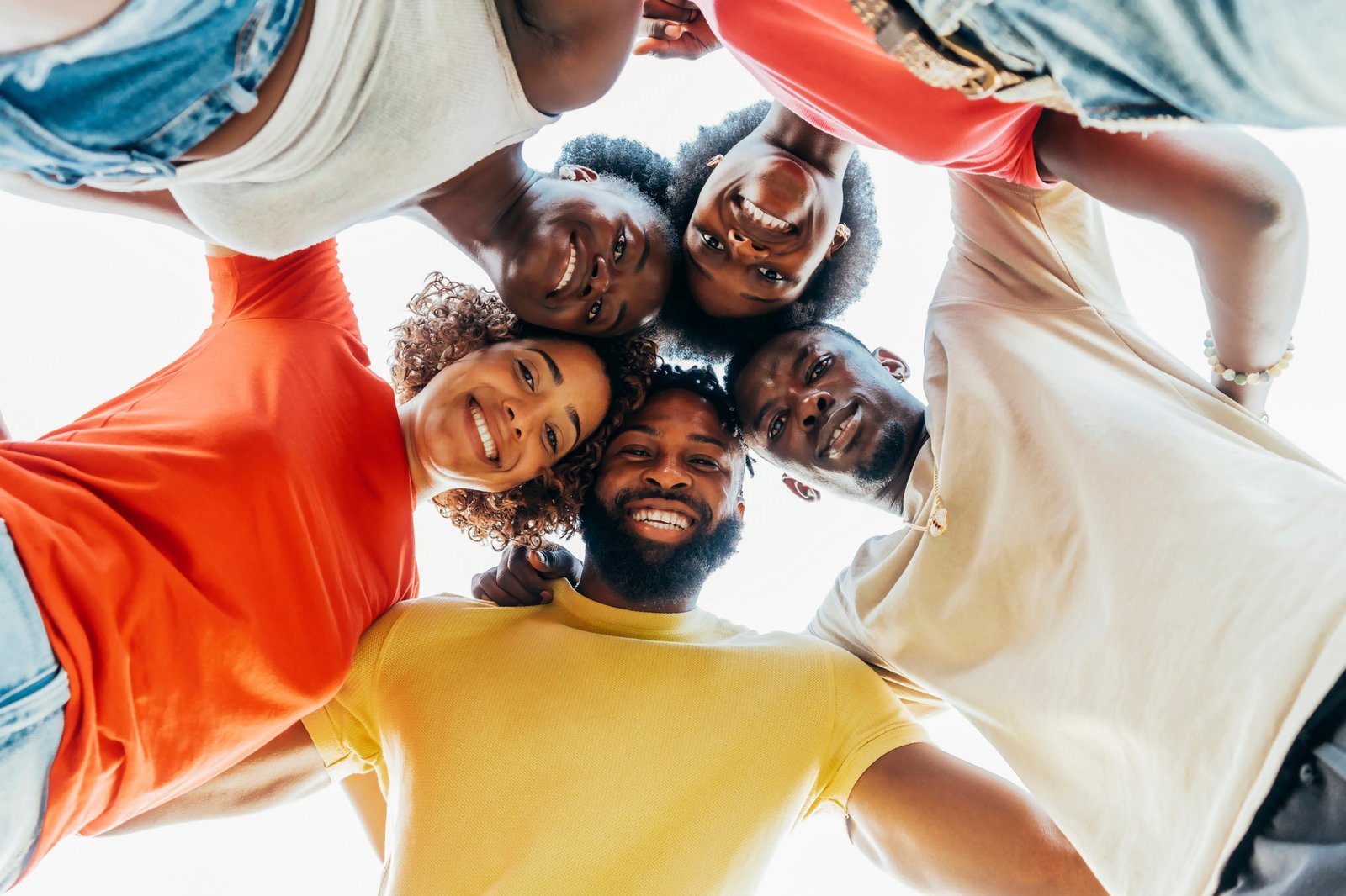 Millennial african people taking selfie in circle together